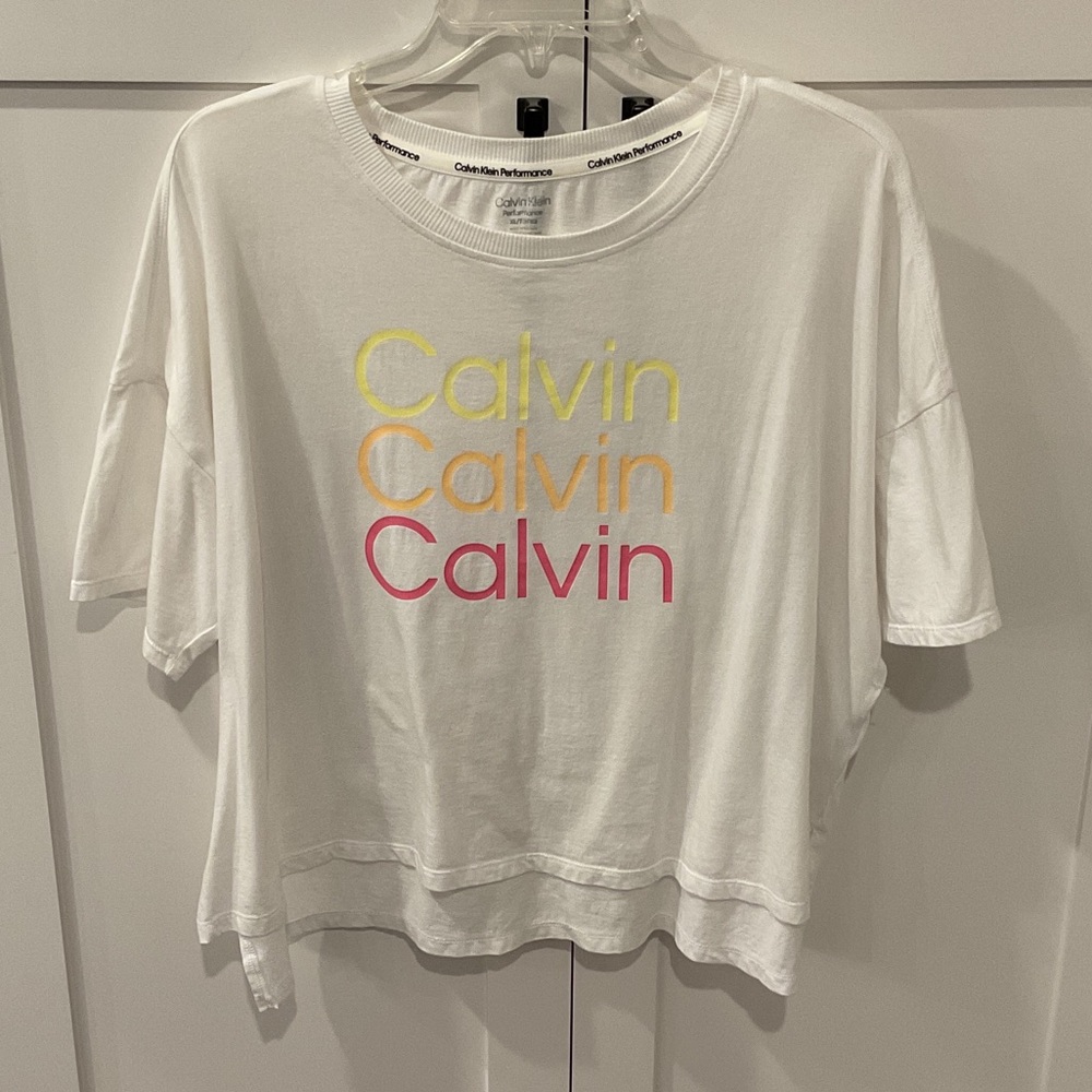 Calvin Klein Cropped White Short-Sleeve Tee with Yellow-Orange-Pink Logo